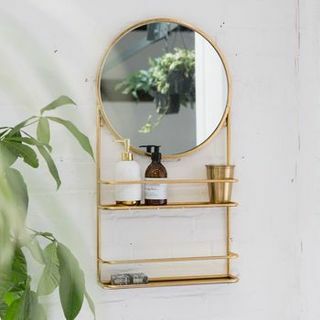 Espejo de baño circular dorado o plateado con estantes