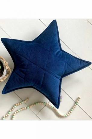 Almohada de terciopelo azul marino con estrellas